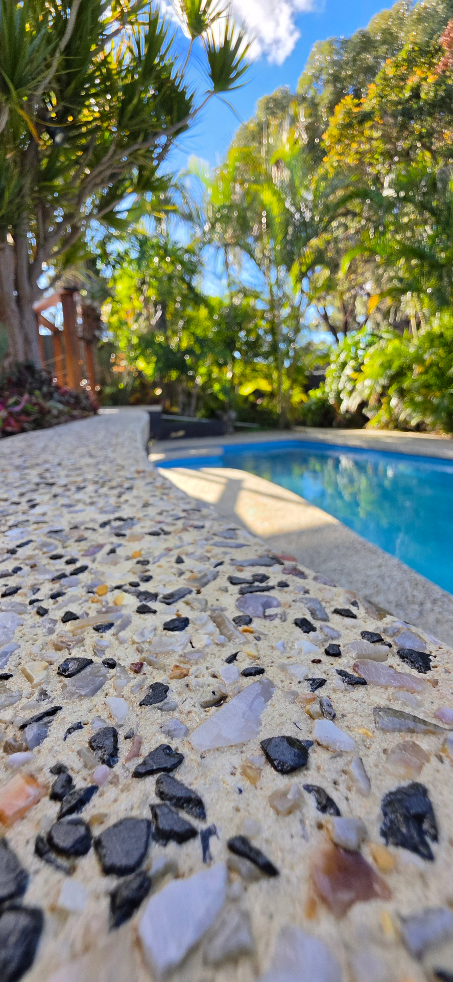 Honed washed aggregate around a Perth pool